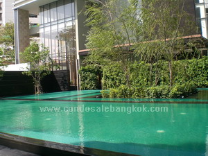 Condo for sale in Sukhumvit 24 Emporio Place 135 sq.m. 2 bedrooms 2 bathrooms. Duplex style. Good layout. Double volume windows and very bright! Sale with tanant, look for only serious buyer!